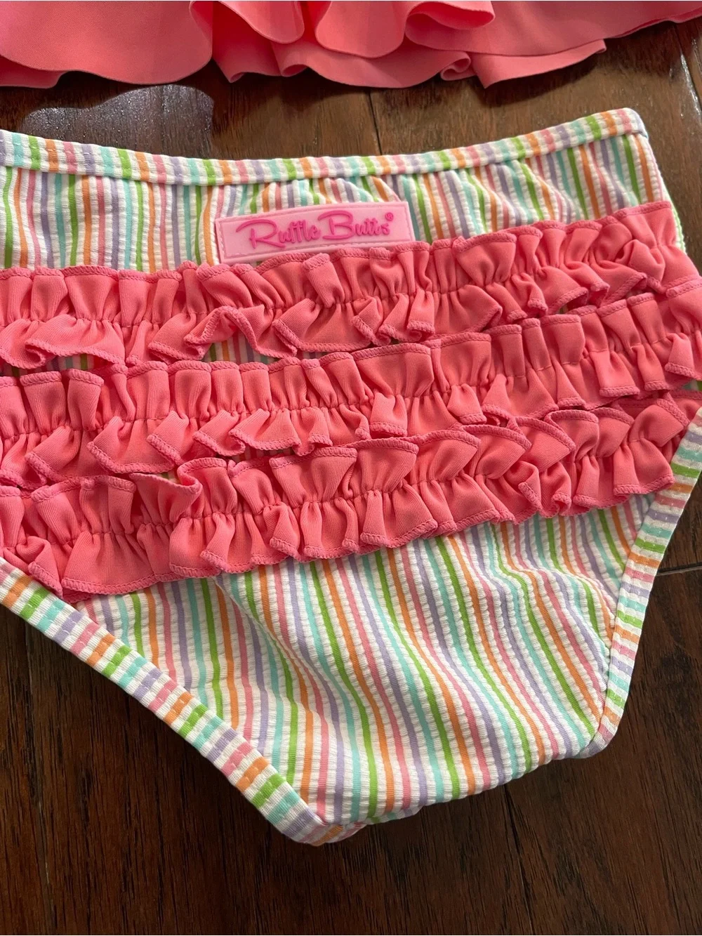 Ruffle Butts Pink Ruffled Tankini Top with Rainbow Striped Trim